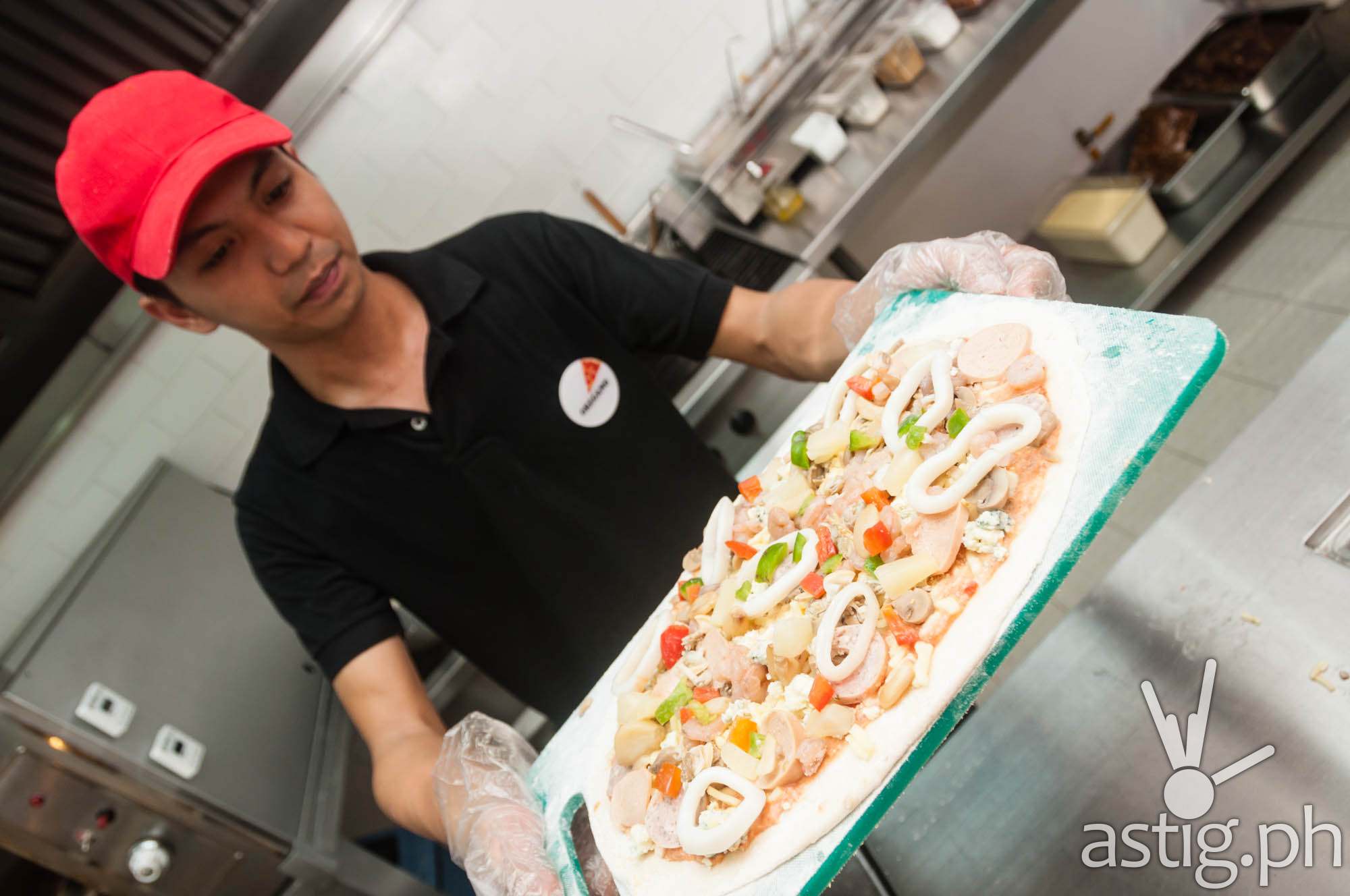 Mad for Pizza lets you create your own hand-tossed, freshly prepared pizza (280 PHP)