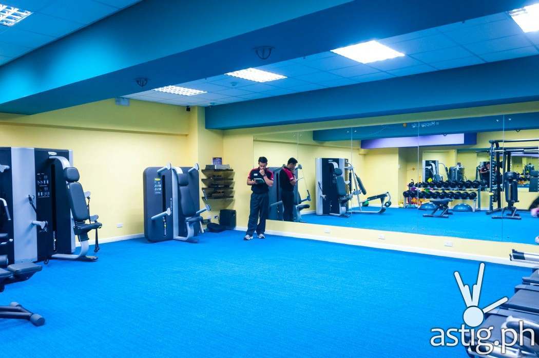 The gym: Employees need only to pay a minimal fee of 50 pesos to use this gym. That's their instructior standing in the corner!