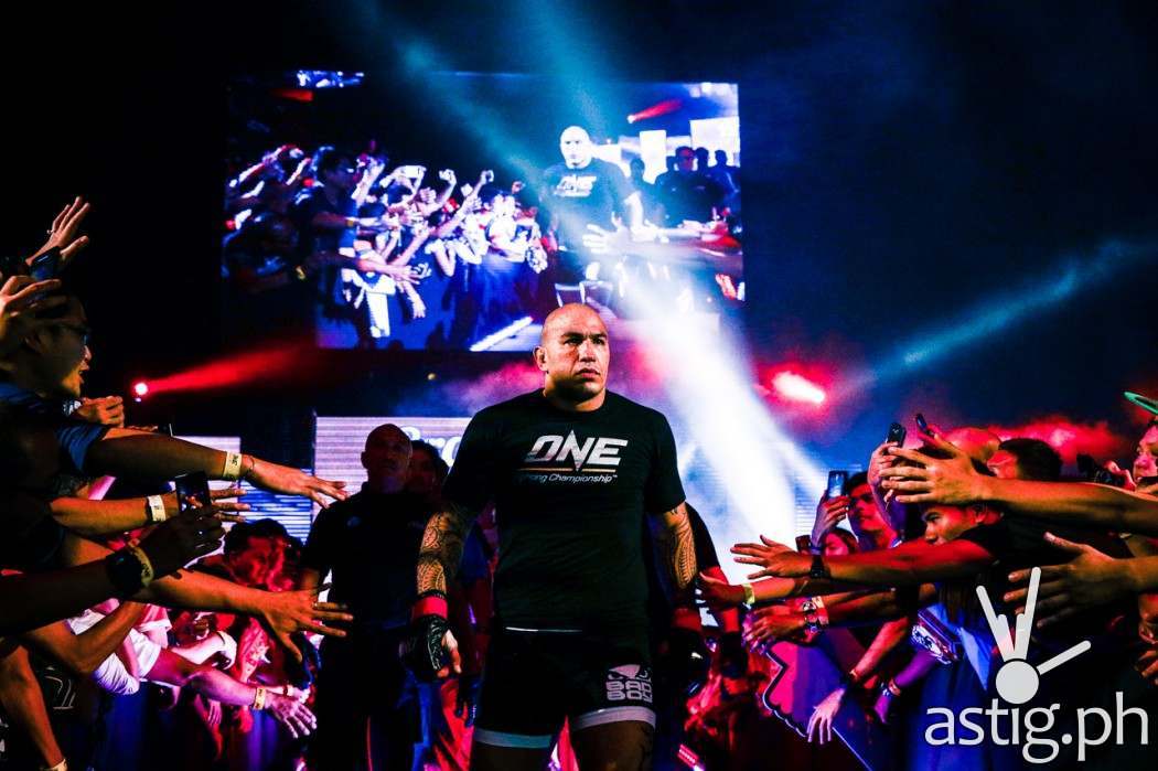 Brandon Vera enters the ring while "Coming Home" by Armin Van Buuren blasts in the background