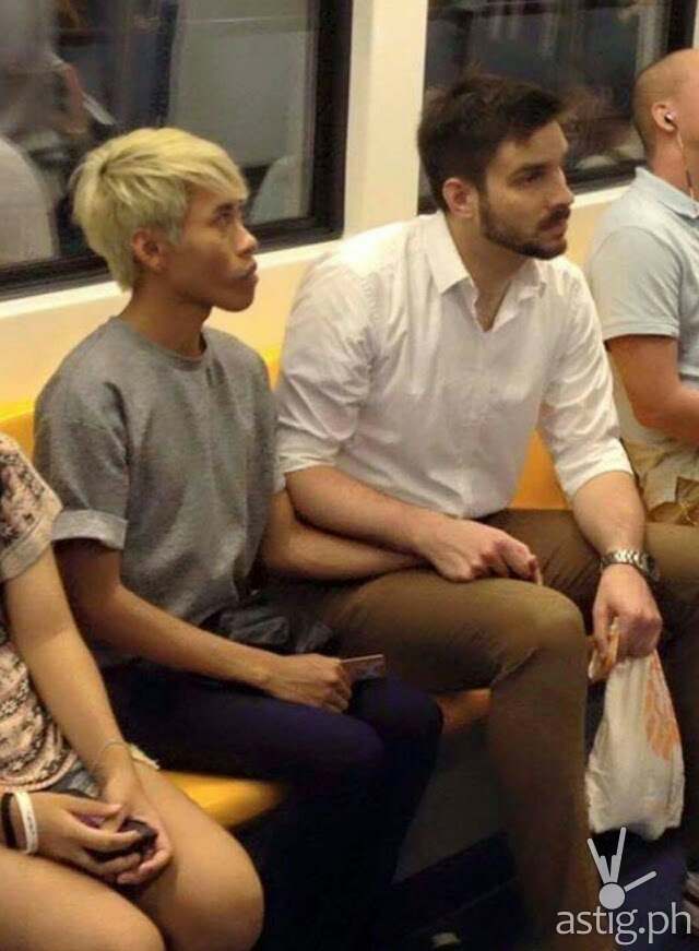 Naparuj Mond Kaendi and boyfriend Thorsten Mid are seen here holding hands while inside a train