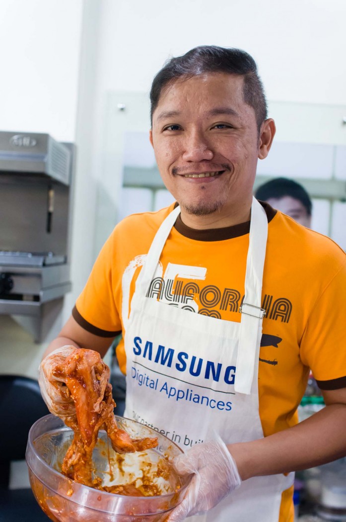 Jonel Uy (joneluy.com) prepares his chicken by covering it in marinade