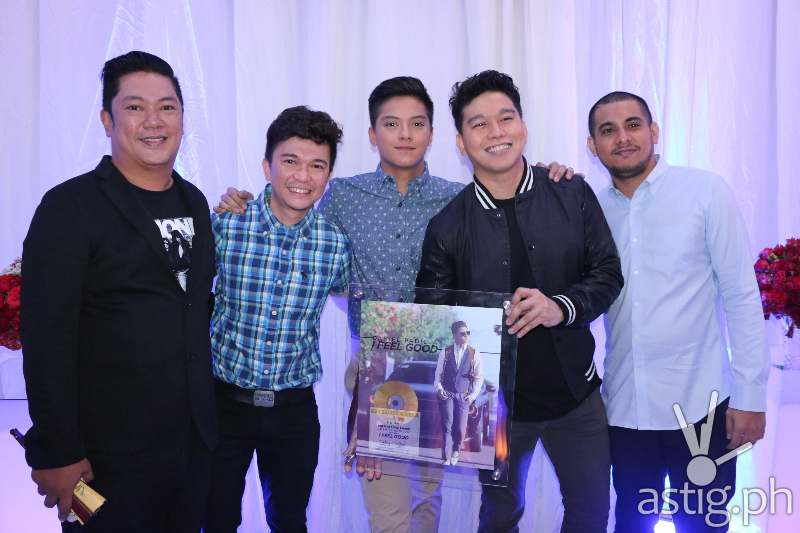 Daniel Padilla receives his gold record award for I Feel Good with Star Music head Roxy Liquigan and the album producers