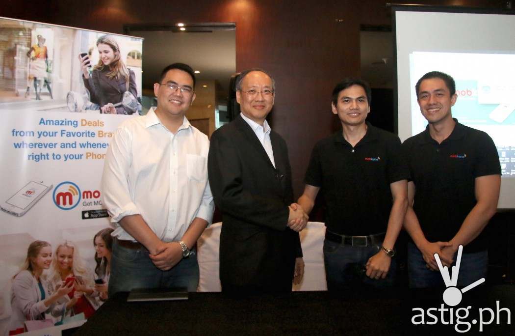 IdeaSpace-backed startup TheKard Inc., makers of Mobkard, seals the deal for P17 million in additional funding led by digital advertising leader Globaltronics Inc. In photo are (from left) IdeaSpace President Earl Martin Valencia, Globaltronics CEO William T. Guido, and TheKard co-founders Francis Uy and Carlo Calimon.