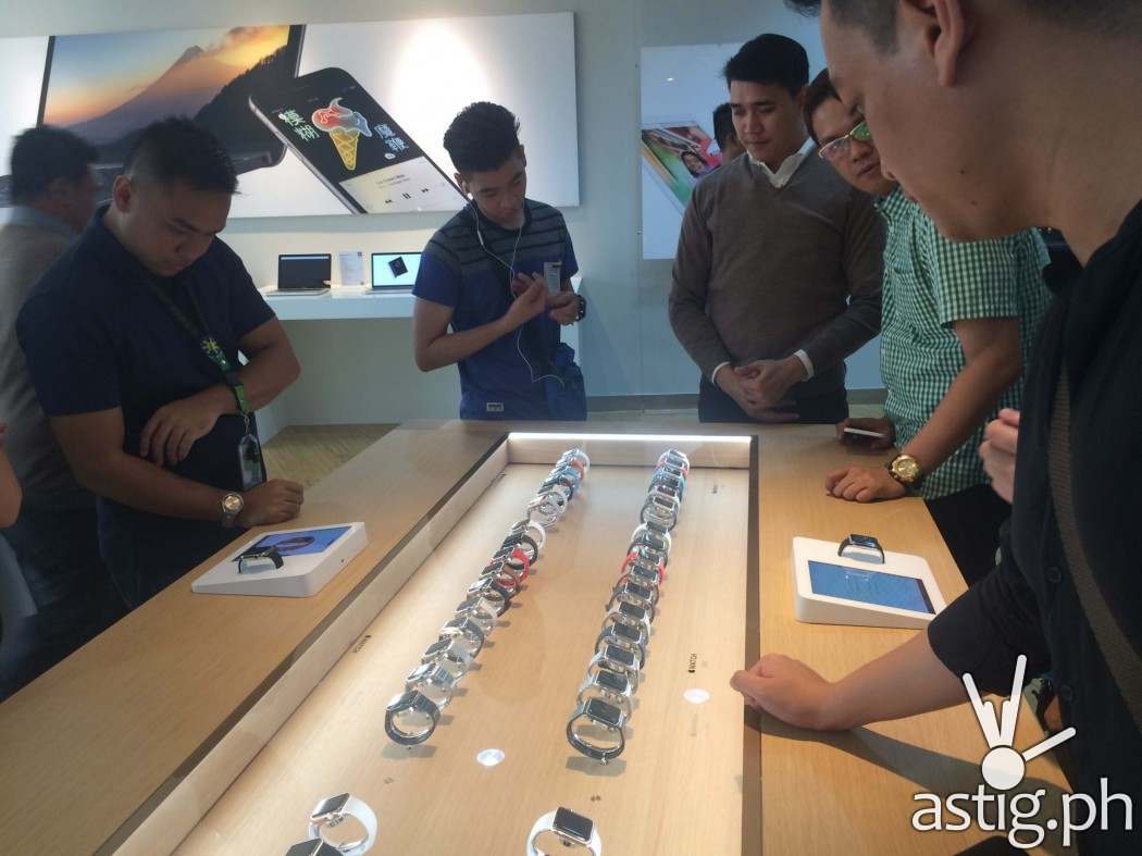 Customers check out the newly launched Apple Watch with the assistance of an Apple Watch Expert at Power Mac Center Greenbelt 3