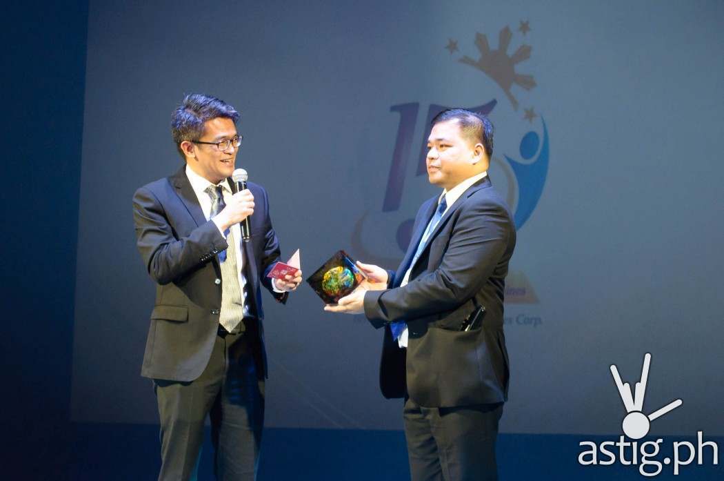 Lim Heng Boon, , Director of Finance and Human Resource from Brother International Singapore, honors Brother Philippines President Glenn Hocson at the 15th anniversary celebration held in Green Sun Hotel, Makati