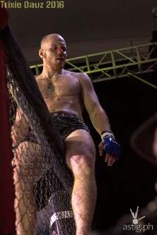 Michael Vostry climbed on the cage's side upon his win over Patrick Manicad
