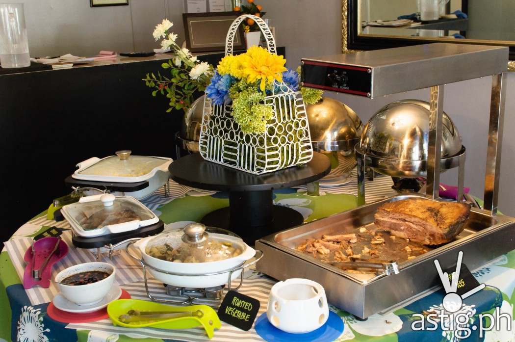 Buffet table spread at The Round Table Kapitolyo