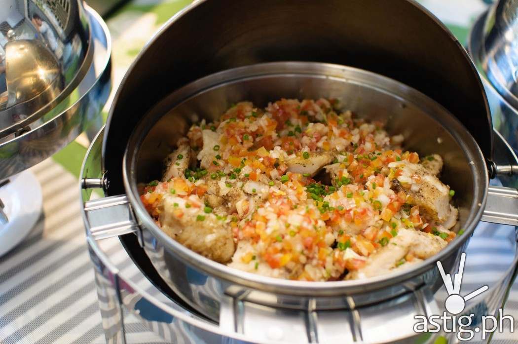 Pan-grilled fish with onion and tomato at The Round Table Kapitolyo