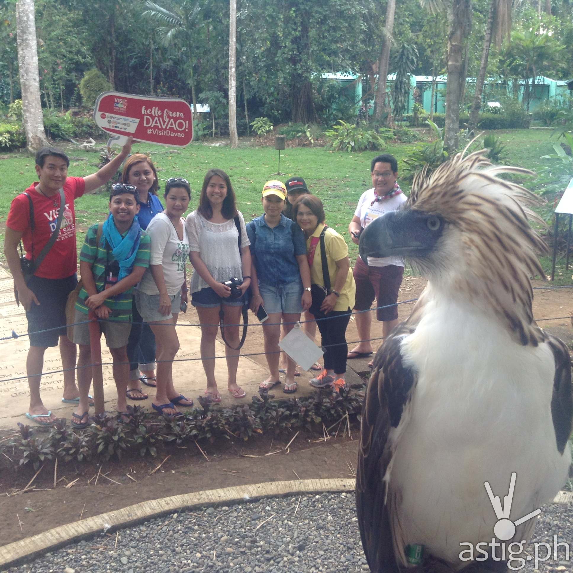 A Philippine eagle name fighter does a selfie with guests at the Philippine Eagle Center