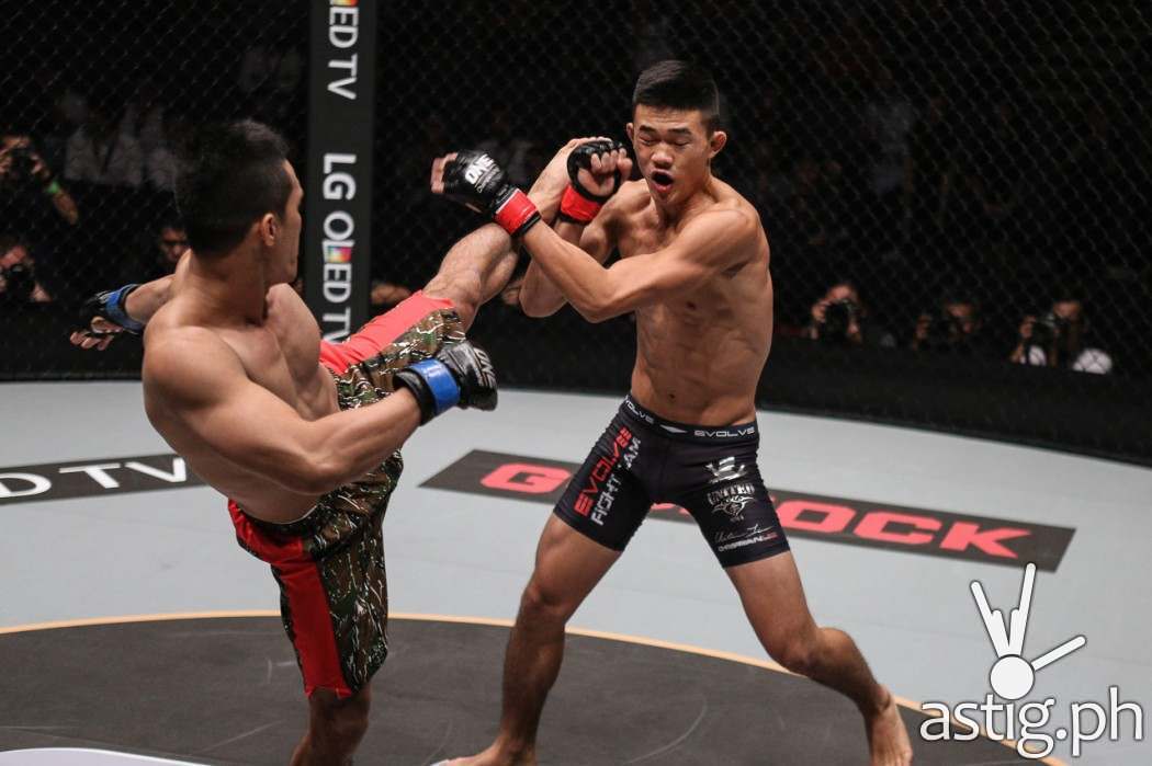 Singapore’s Christian “The Warrior” Lee continues his meteoric rise through the ranks with his fourth straight stoppage victory, turning in a sensational performance against the Philippines’ Cary “The Prince” Bullos to win by submission