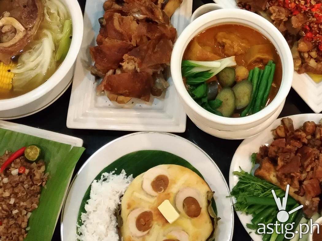 Clockwise from top-left Bulalo with Mais, Original Crispy Pata, Kare-Kare, Patang Demonyo, Crispy Pata, Prichon Pata, Bibingka, Sisig ni Mely - Mangan Restaurant Glorietta 2