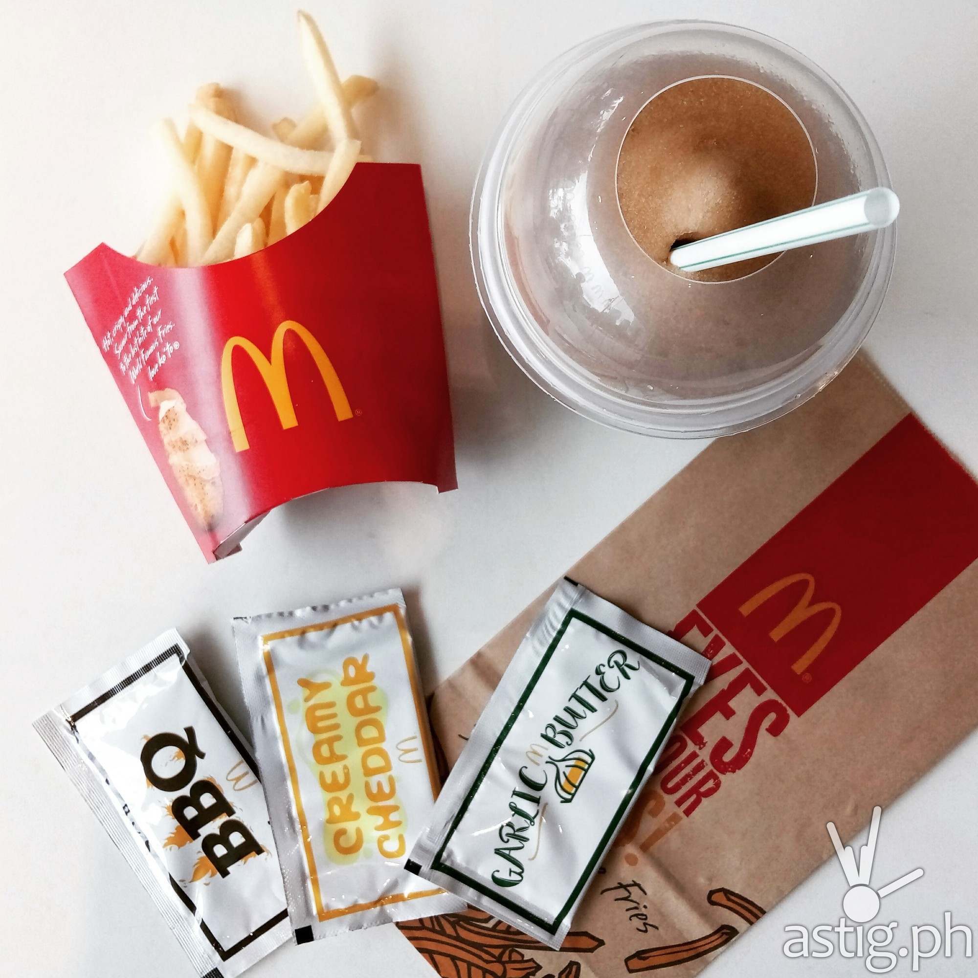 McDonald's Shake Shake fries comes in 3 flavors: BBQ, Cheese, and Garlic Butter