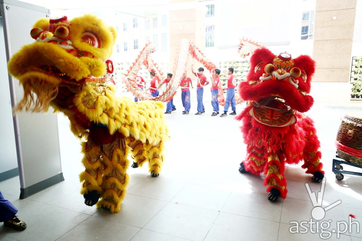 Ceremonial Lion and Dragon dance - Man Ho Chinese restaurant