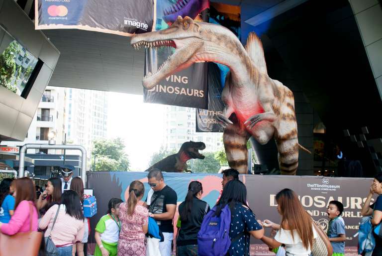 Spinosaurus and Tyrannosaurus Rex - Dinosaurs Around The World exhibit - Mind Museum BGC