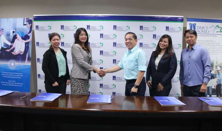 Leaders in real estate and healthcare tie up for a discount program for condo communities. DMCI Homes and The Medical City officers forge a partnership to provide in-patient services discount for residents of condo communities. Photo shows (from left to right) DMCI Homes Corporate Communications Manager Josephine Cruz, The Medical City Assistant Vice President for Relationship Management and Business Development Emelie Escasinas, DMCI Homes Property Management Corporation (DPMC) Senior Vice President Enrico C. Wong, The Medical City Assistant Manager Bernadette Remo and DPMC Operations Manager Frederick Rapiñan during the signing of the agreement recently at the DMCI Homes Corporate Center in Makati City.