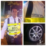 BGC Carpark marshal changes woman’s tire without complaint [viral]