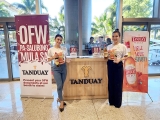 Tanduay Gives Homecoming Gifts to Returning OFWs at Cebu Airport